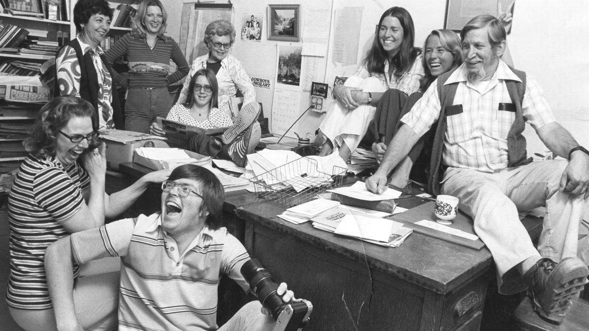 Cambrian Editor Scoop Morgan, right, and staff enjoy a light moment in the 1970s.