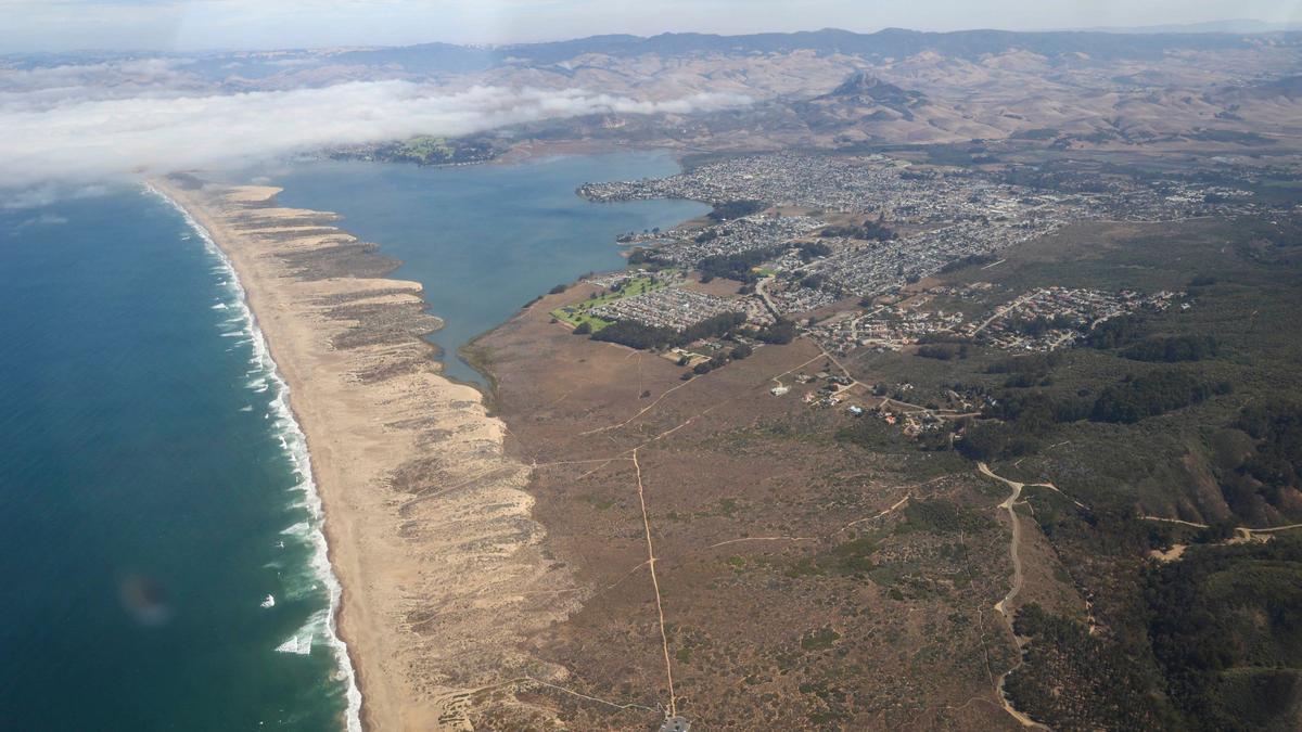 Fog covers Morro Bay, while Montaña de Oro State Park remains in the sunshine. The Northern Chumash Tribal Council organized an aerial tour of lands bordering the Chumash Heritage National Marine Sanctuary on Sept. 18, 2024. The flight was sponsored by EcoFlight, a nonprofit dedicated to appreciation of the environment.