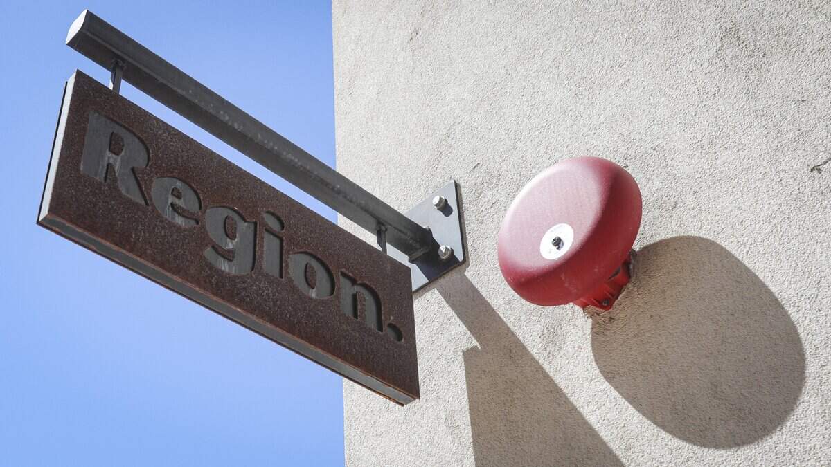 Sign announcing the closure of Region's San Luis Obispo location is in the window July 15, 2026.