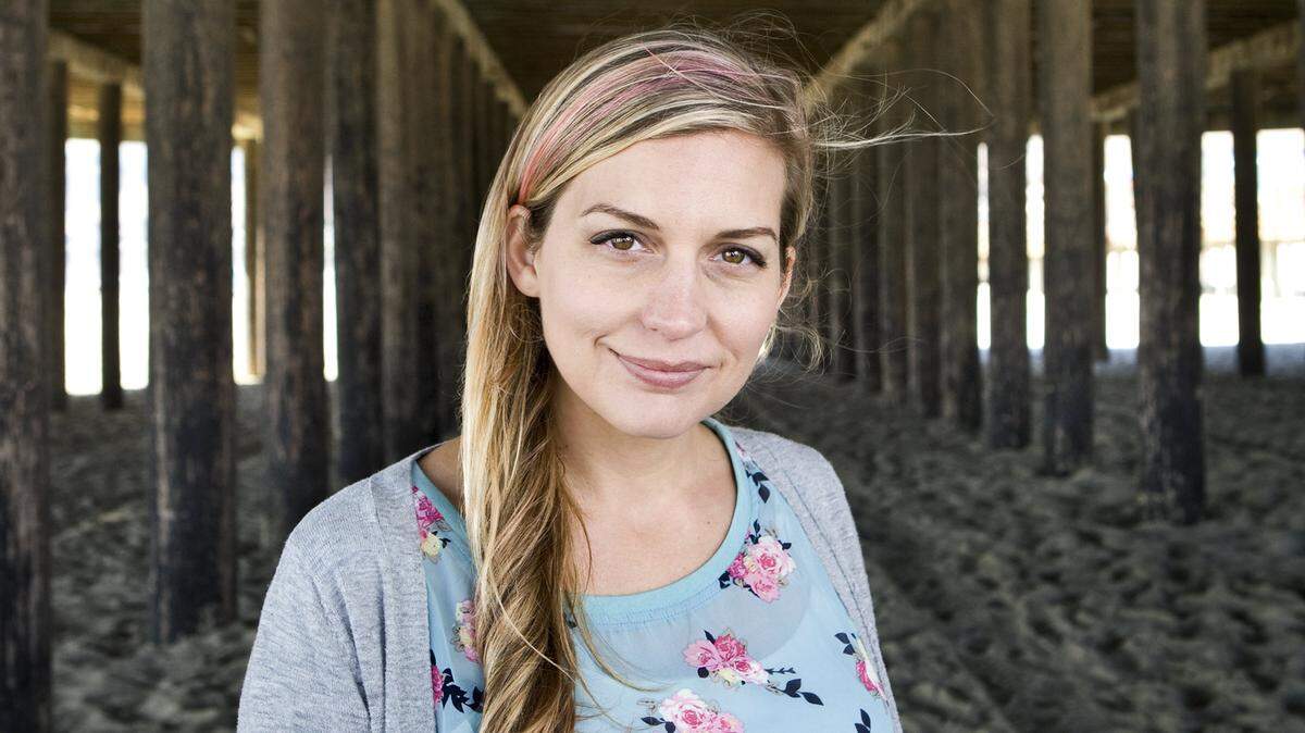 Author Mary Weber, at the Pismo Beach pier, often finds inspiration during her visits to the beach. Her young adult novel
‘Storm Siren,’ the first in a trilogy, was published in August.