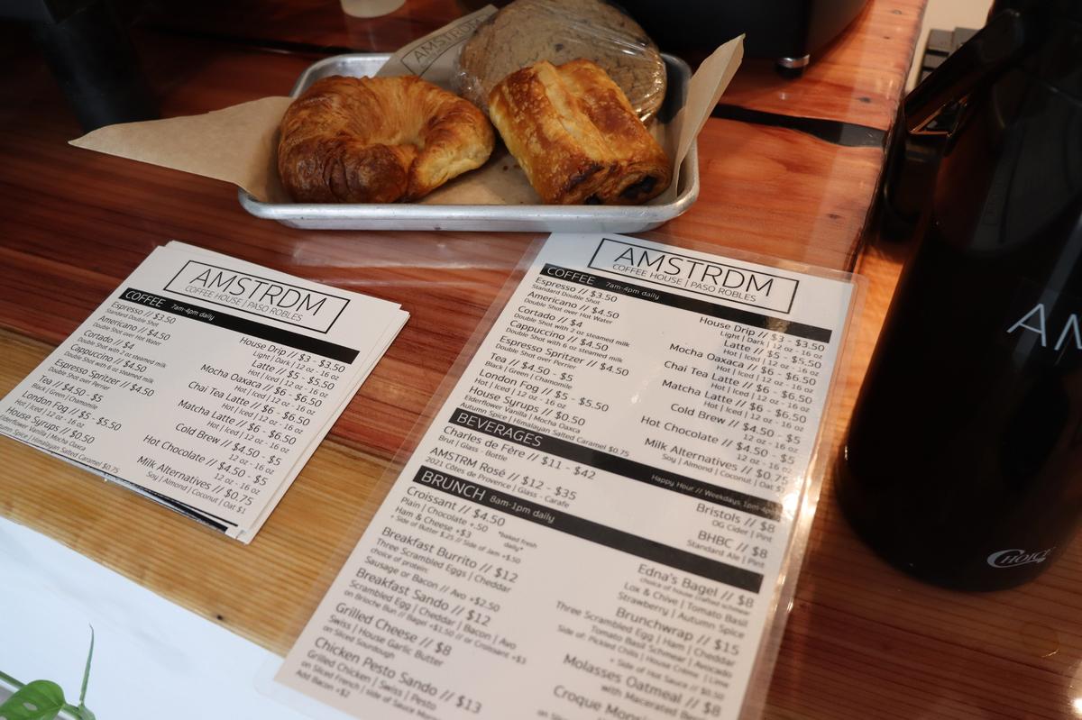 AMSTRDM offers a unique menu of waffle-pressed sandwiches and creative drinks like their espresso spritzer — a double shot over Perrier sparkling water — and lattes with unique house-made syrups like elderflower vanilla and their popular himalayan salted caramel.