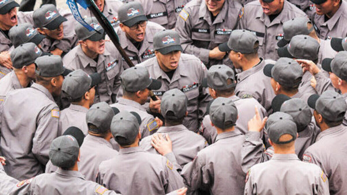 Grizzly Youth Academy cadets celebrate their graduation at a ceremony held at Cal Poly on Dec. 19, 2014. More than 200 cadets graduated that session.