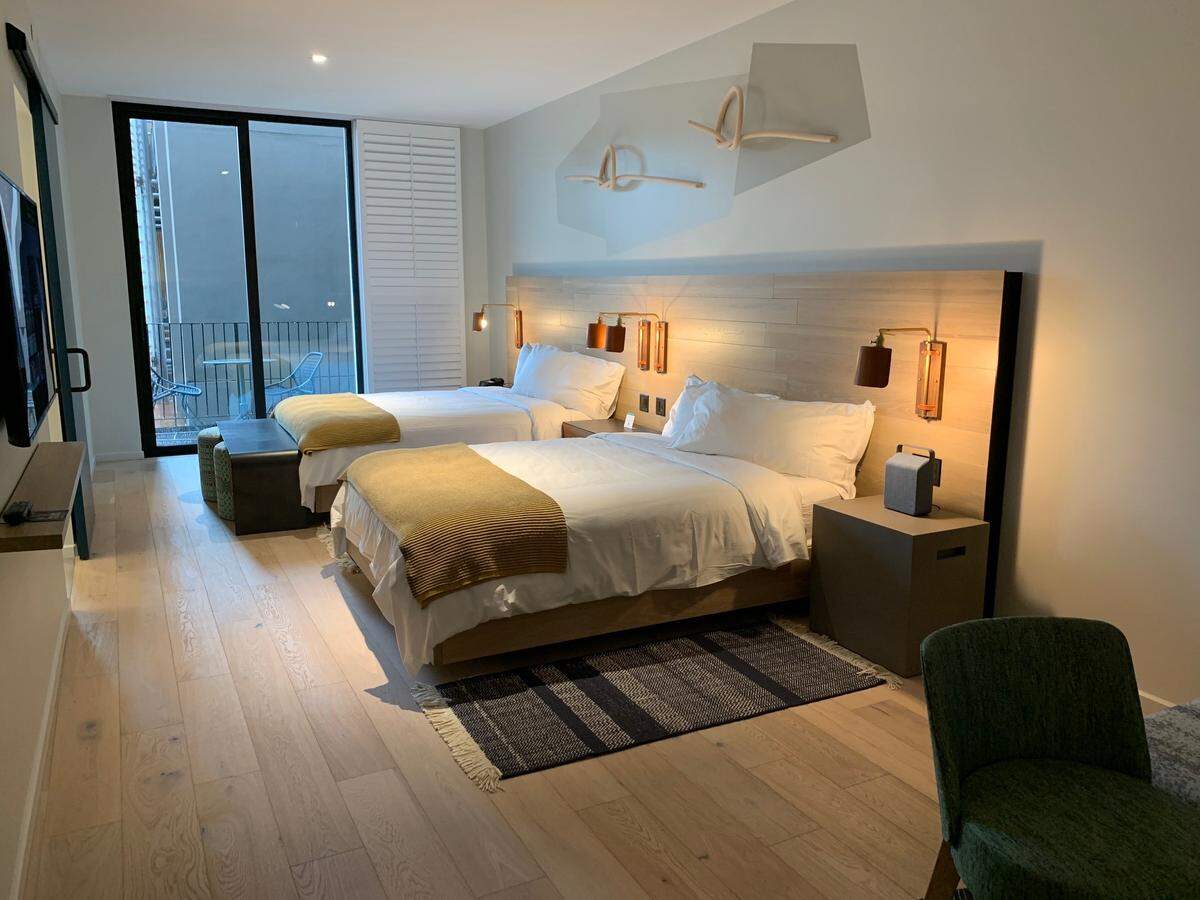 A two-queen room at Hotel San Luis Obispo features sleek lines and modern look.
