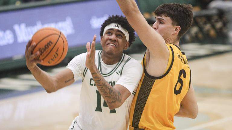 Cal Poly beats Long Beach State 102-92. See the photos