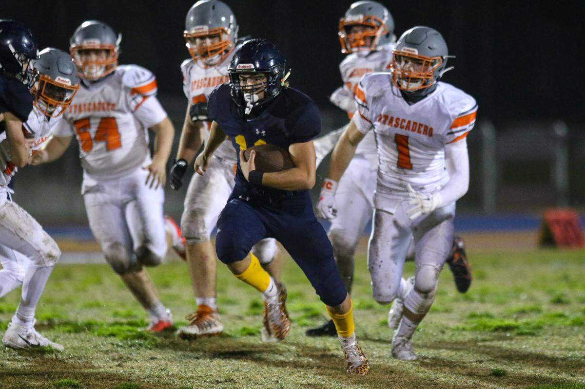 Makai Puga breaks for a big run for the Eagles. Arroyo Grande hosted Atascadero for the coronavirus delayed first game of the 2020 season, held in March 2021. Puga will play football at Hancock College next year.