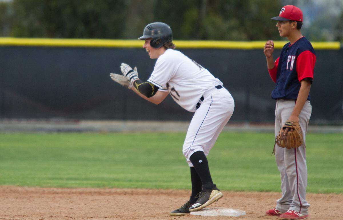 Cooper Benson celebrates one of his two doubles in San Luis Obispo’s 8-4 CIF-Central Section Division I playoff victory over Western Tulare. Benson is a projected second-round pick in the upcoming MLB draft and is committed to Arizona State.