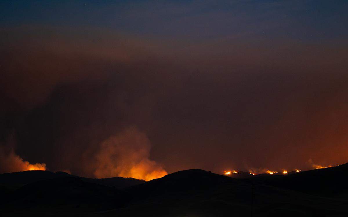 The Gifford Fire burns in eastern San Luis Obispo County in a view from California Valley on Aug. 4, 2025.