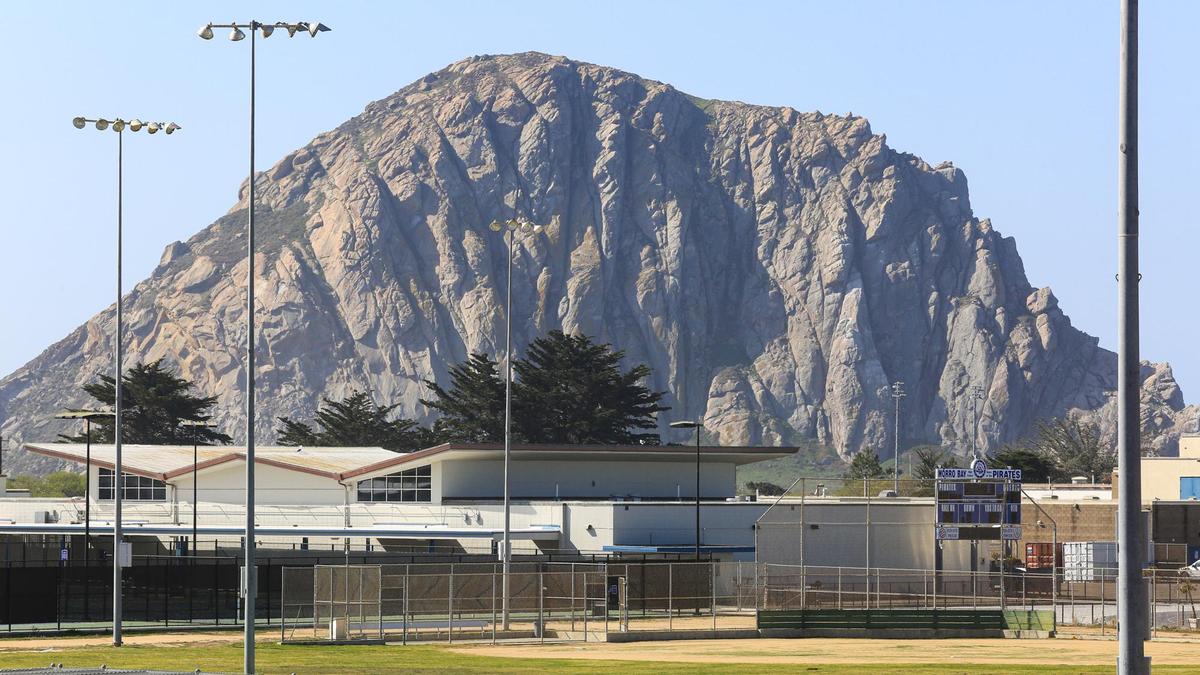Morro Rock looms in the background behind Morro Bay High School.