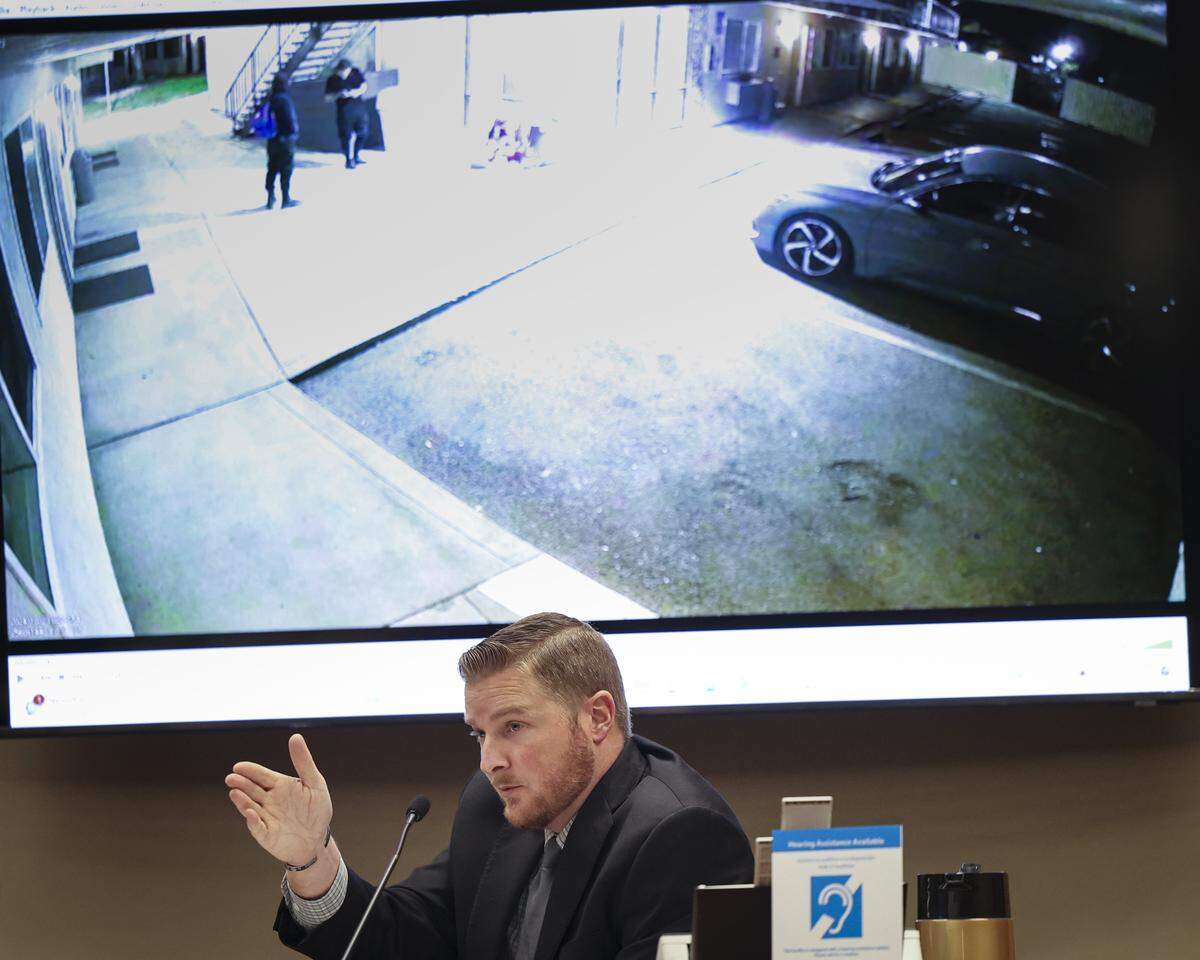 Atascadero police Sgt. Christopher Hall describes what is seen on Motel 6 surveillance video. This was at preliminary hearing on Dec.10, 2025, for Tyler Stevens, charged with the murder of Todd Joseph Pinion, who was last seen alive Oct. 23, 2024. Pinon is seated at the door, standing are Stevens and Garrett Heggarty.