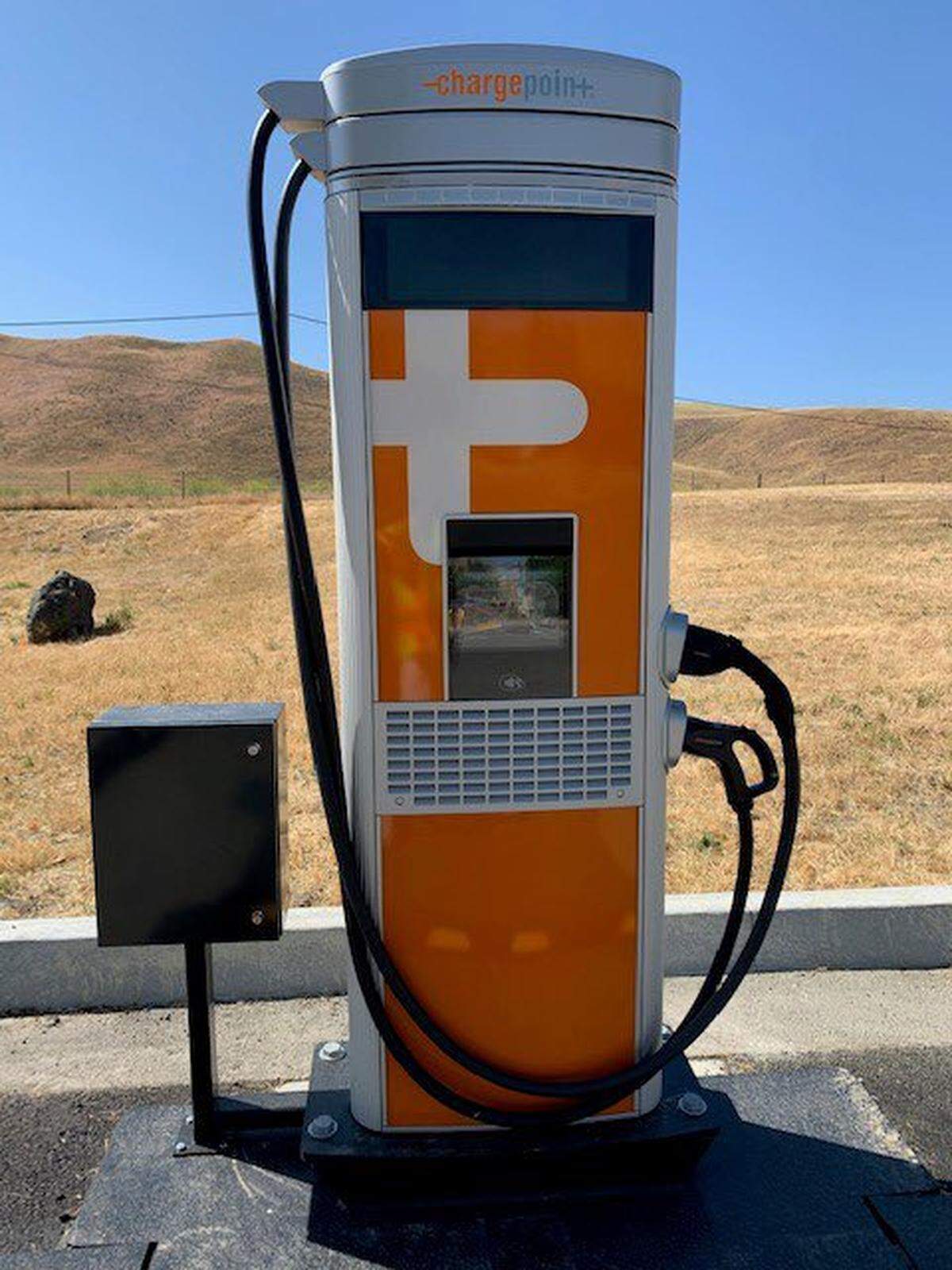 An electronic vehicle charging station is seen at the Shandon rest stop area off Highway 46 East.