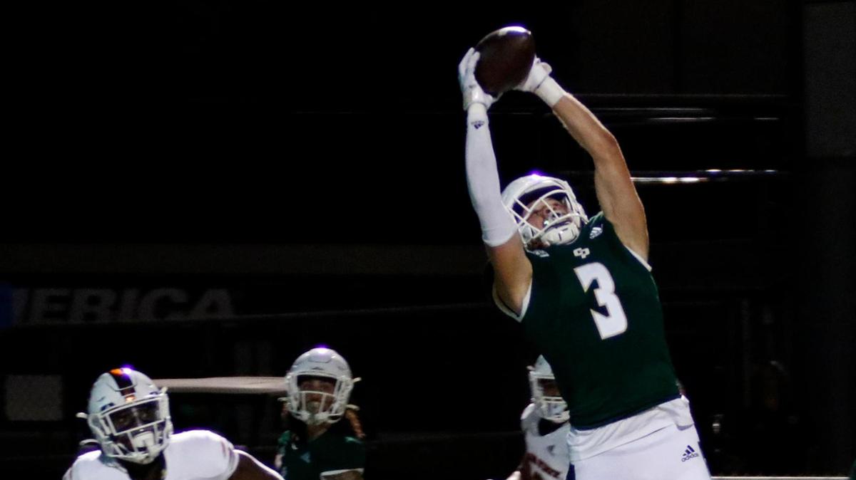 Cal Poly wide receiver Xavier Moore (3) hauls in a pass for a second quarter touchdown in the Mustangs’ 32-29 win over Idaho State at Alex G. Spanos Stadium on Nov. 13, 2021.