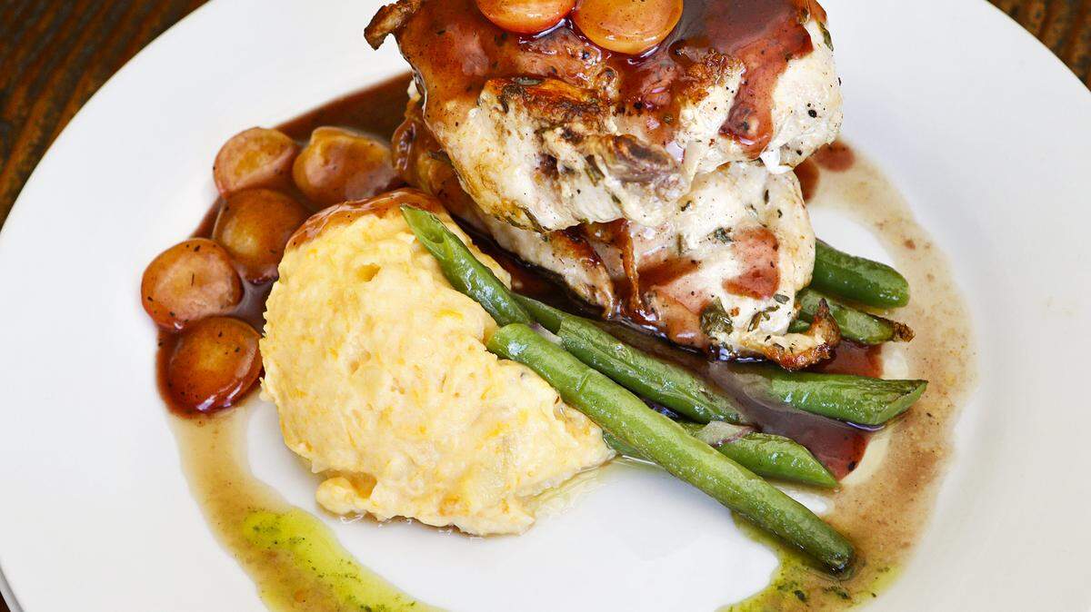 Mary's free range-chicken with Washington cherry port sauce is among the dinner entree options at Comfort Market in Arroyo Grande.