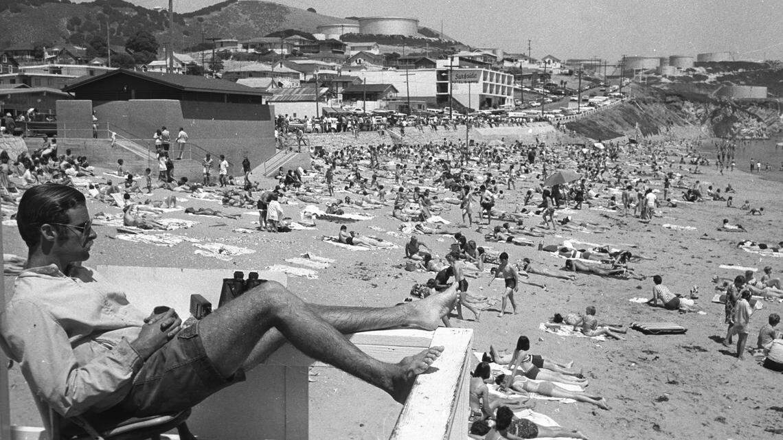 Lifeguard Hardie Phillip watches over crowd at Avila Beach on May 30, 1968.