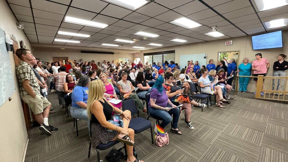Community members overflow the Atascadero Unified School District’s board of trustees meeting room on Tuesday, Aug. 15, to speak about the LGBTQ+ Pride flag being flown in classrooms.