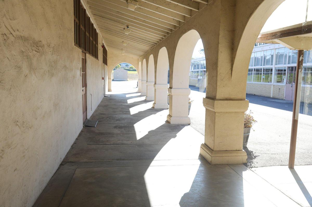 Sunshine lights up an outside hallway on the campus of the former Morro Elementary School in 2020.
