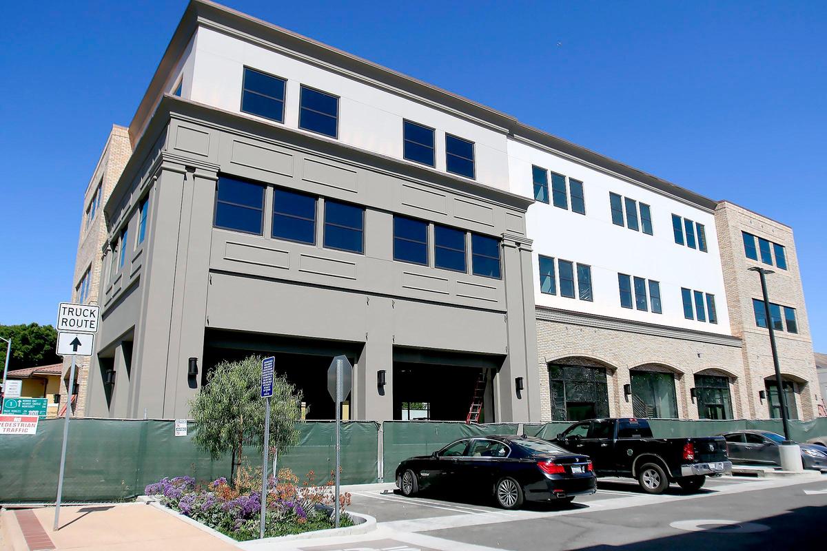 The plans for a building under construction at 1101 Monterey St. in San Luis Obispo originally included 60 units of Peoples’ Self-Help workforce and affordable housing. But community opposition to the size of the project forced the developer to scale back.