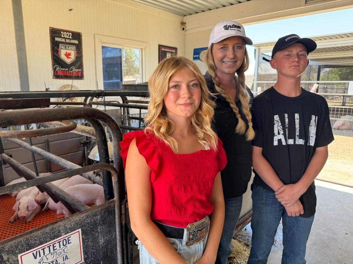 From left, Karis Dadson, Karalyn Dadson and Krew Dadson pose for a photo at their pig farm in Paso Robles.