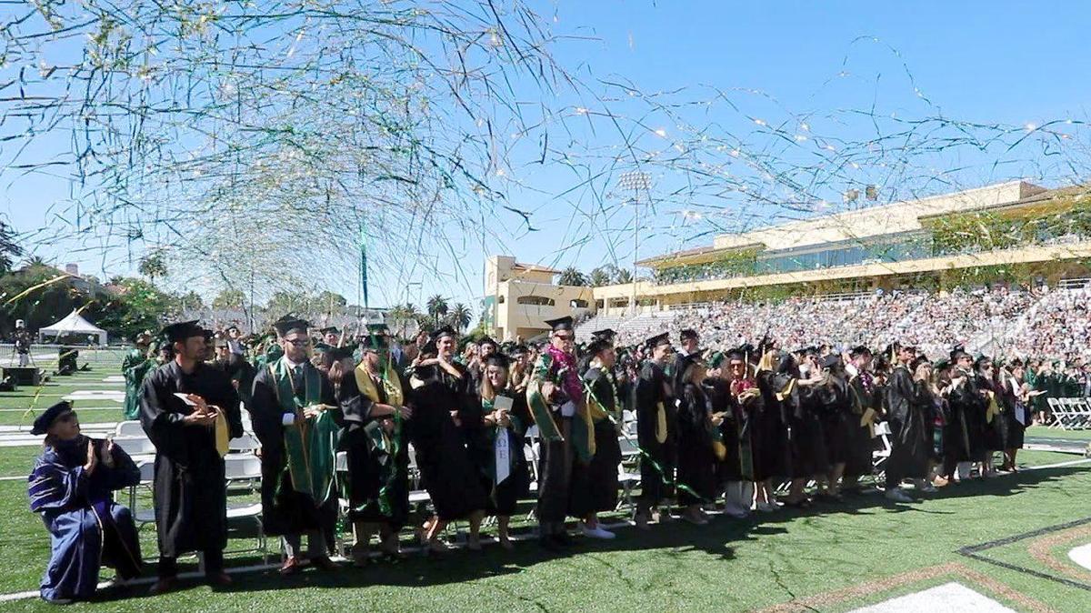 Confetti flys as Cal Poly began a series of graduations with the College of Agriculture, Food and Environmental Sciences at Spanos Stadium June 11, 2022.