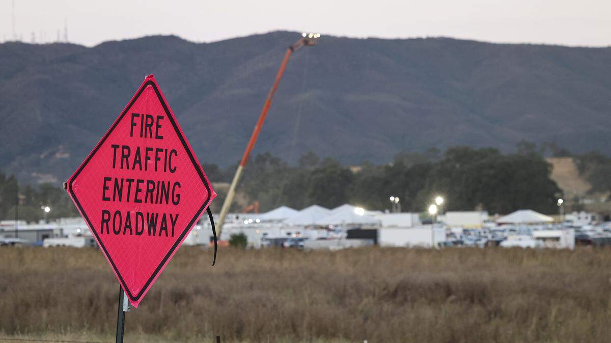 The fire camp on Santa Margartia Ranch before sunrise for the firefighters working Gifford Fire on Aug. 12, 2025.