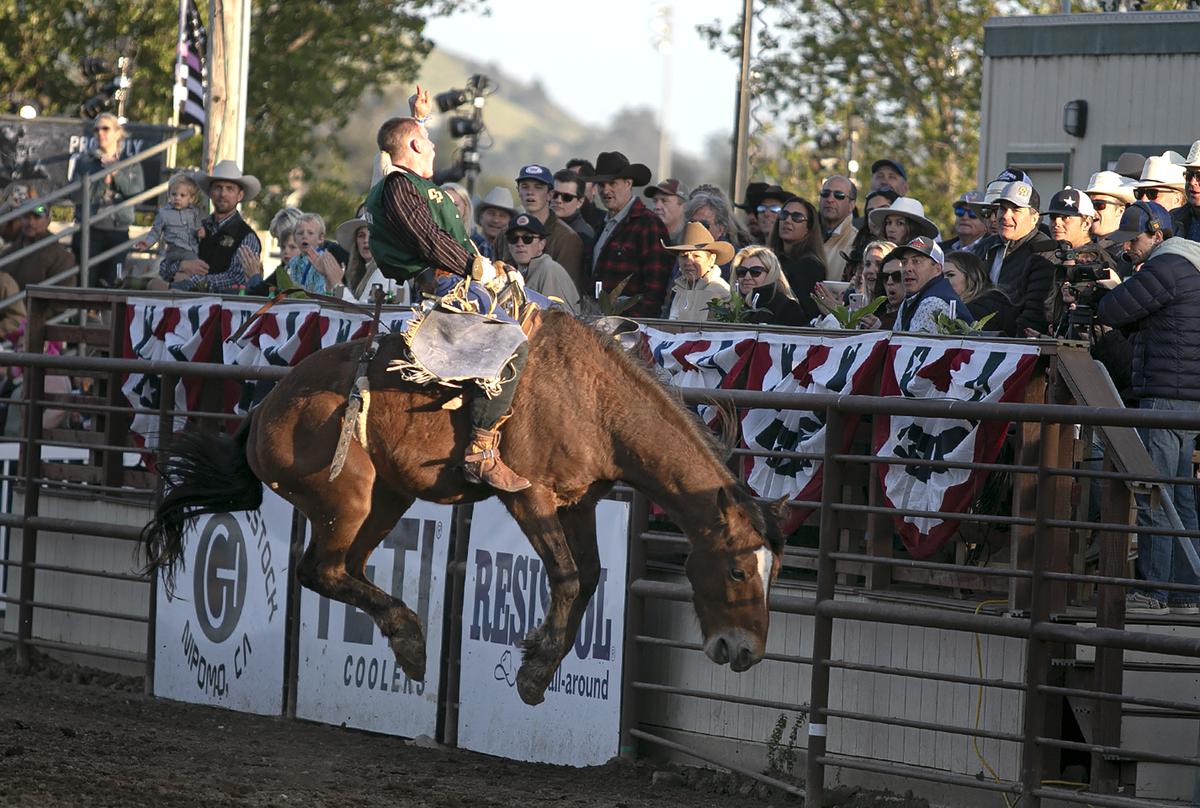 Cal Poly Rodeo Team member Wyatt Wood competes in the bareback riding event at the Poly Royal Rodeo on Saturday, April 15, 2023, which he went on to win. The 81st annual Poly Royal Rodeo was held Friday and Saturday, April 14 and 15, 2023, at the Cotton Rosser Rodeo Complex in San Luis Obispo.