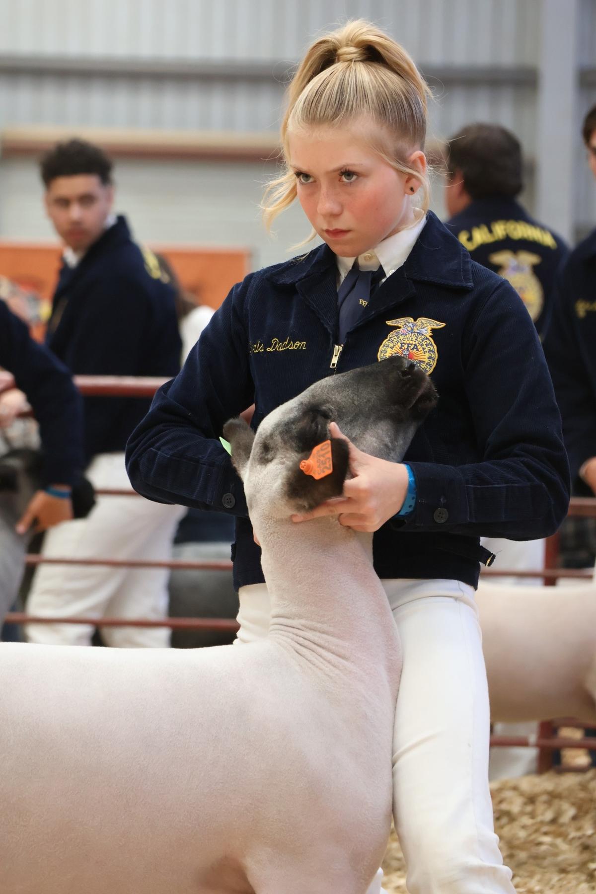Karis Dadson is famous on the internet for her serious stare at swine showmanship events.