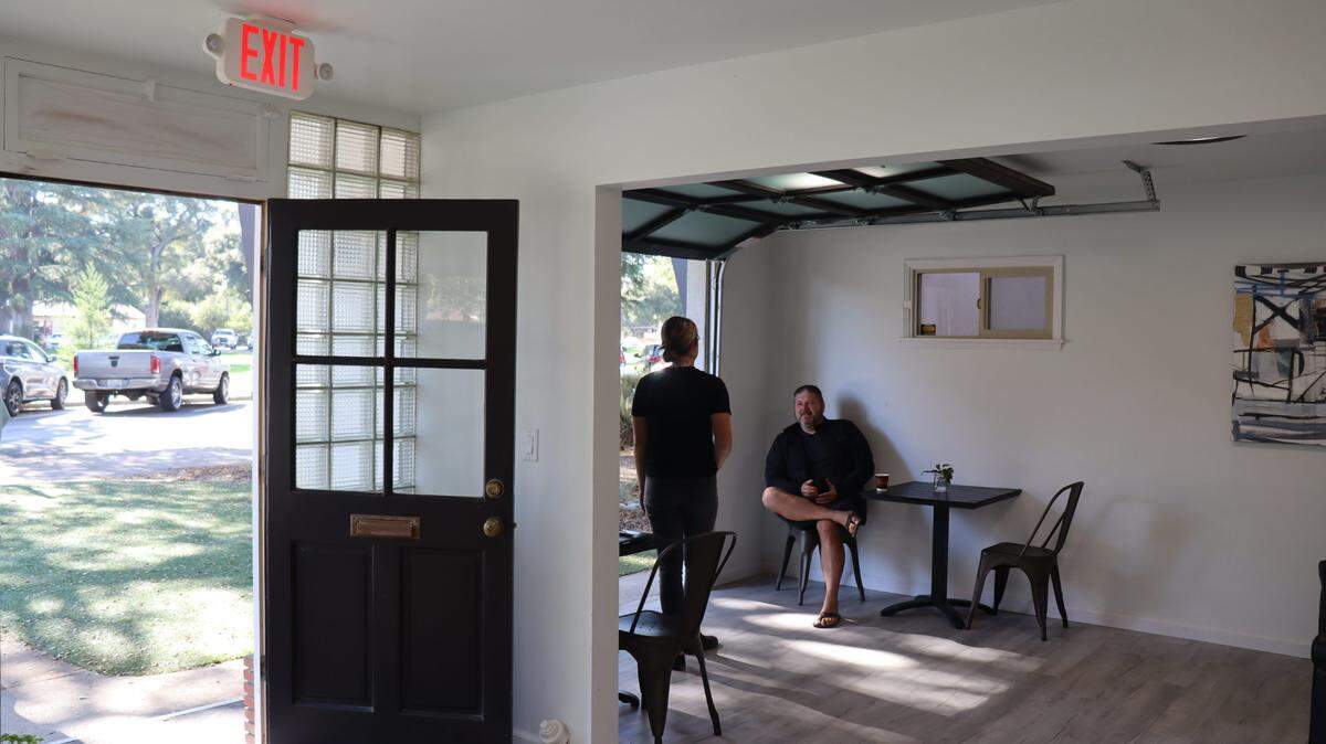AMSTRDM Coffee House owners Katelyn Smith and Corey Jordan remodeled an old optometrist’s office in Atascadero for a second location for their shop, breaking down walls and adding in a large sliding garage door to let in sunlight.