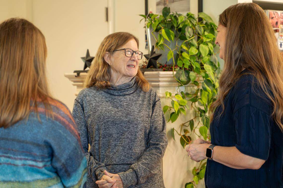 Original Womenade founder Sandy Richards on and her daughter and Womenade SLO founder Elaine Stewart speak with volunteers on Saturday, Dec. 6, 2025. Womenade SLO was founded in April 2025 as a successor to the Womenade organization that served San Luis Obispo County from 2003 to 2019.
