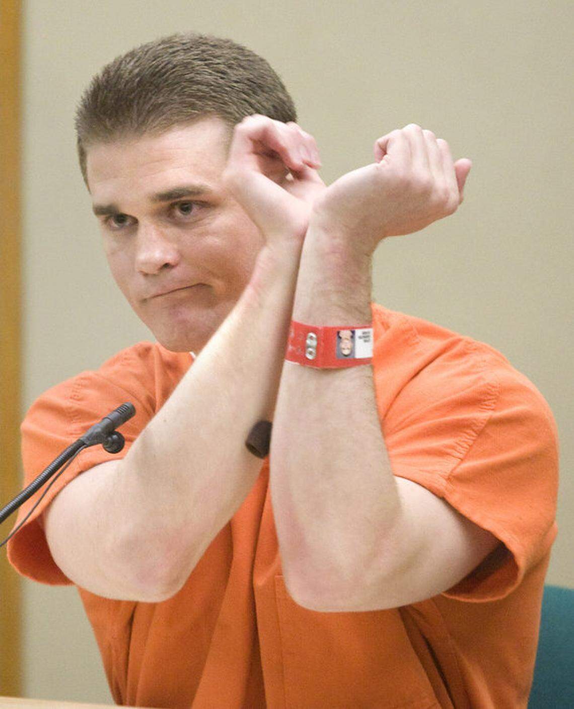 Jason Adam Greenwell demonstrates how Ty Michael Hill bound a drugged Dystiny Myers before she was beaten and killed on Monday, March 18, in San Luis Obispo Superior Court.