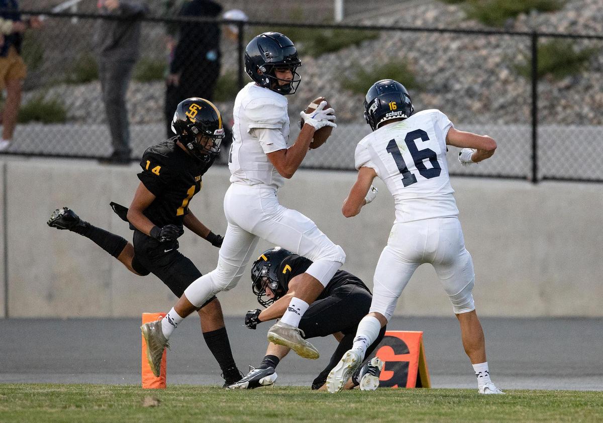 Arroyo Grande’s Damion Santos (11) scores a touchdown in the first half of the Eagles 26-14 win over San Luis Obispo on Friday, Sept. 2, 2022.