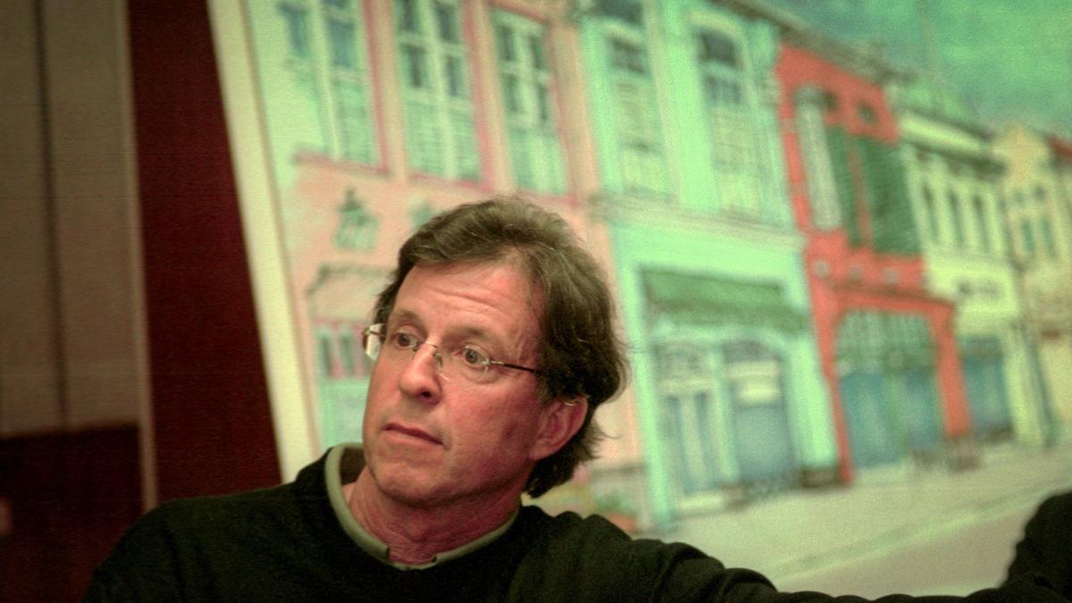 Tom Copeland listens while his Chinatown proposal was presented to the San Luis Obispo City Council by his design team on Sept. 20, 1999.