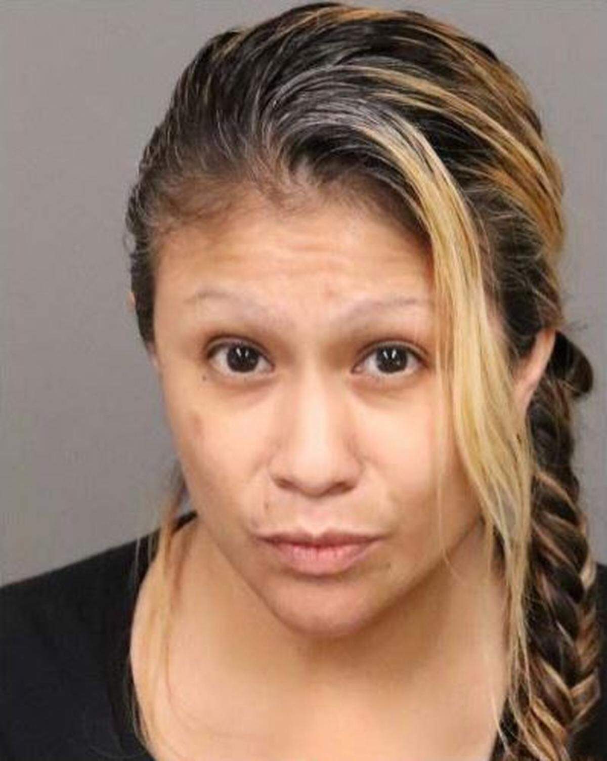 Marie Holquin, of Victorville, was arrested in December 2020 and charged with accessory after the fact and witness intimidation related to the ongoing criminal case of her son, Nicholas Ron, who is charged with the murder of Trevon Perry of Paso Robles.