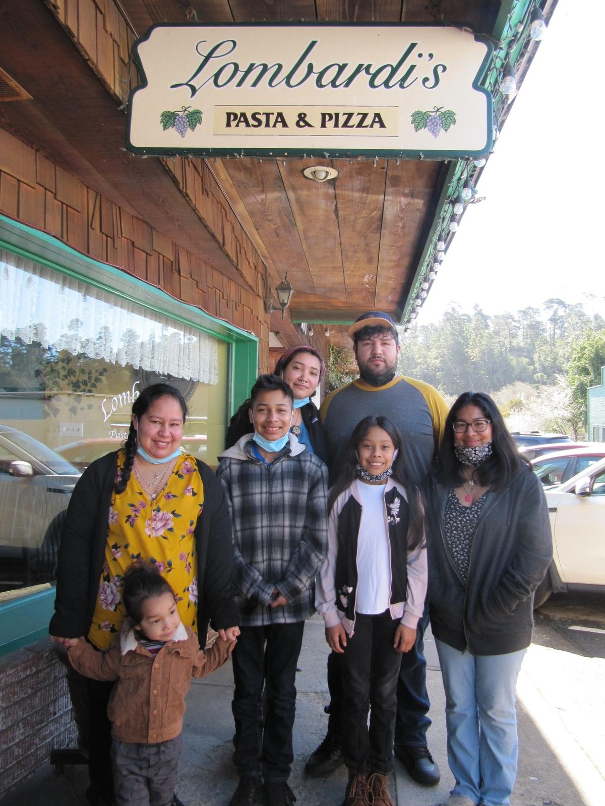 An important member of this family is missing from the portrait in front of their Lombardi’s Pasta Familia restaurant in Cambria: Owner Nestor Hernandez, who died Feb. 8 from complications of the COVID-19 virus. He leaves behind from left: widow Monica Melendrez; and the Hernandez children Itzael, 2; Isai, 12; Naomi; Nestor III; Xochitl, 10; and Zahaira, 15.