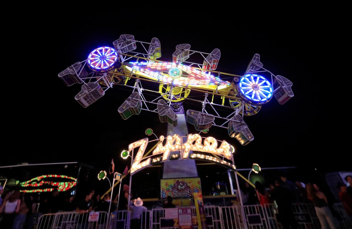 The Zipper lights up the night sky at the Mid-State Fair in July 2021.