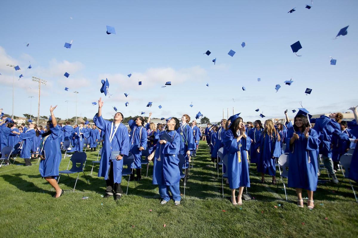 New graduates flip their hats in the air at the conclusion of the graduation ceremony. Morro Bay High School seniors celebrated their Class of 2025 graduations with scholarships and future plans.