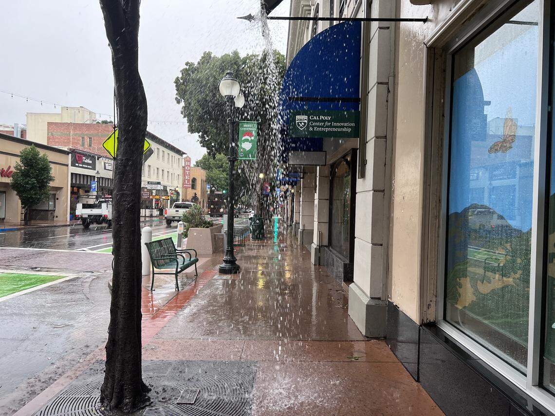 Water drips from an awning in downtown San Luis Obispo in Monday, Jan. 9, 2023.