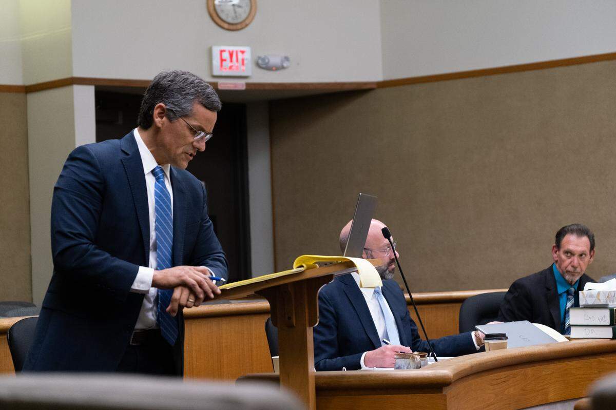 San Luis Obispo County Deputy District Attorney Eric Dobroth questions a witness during the trial against Stephen Deflaun, as San Luis Obispo Deputy District Attorney Ben Blumenthal, center, and defense attorney Raymond Allen listen in San Luis Obispo Superior Court on Apr. 24, 2023.
