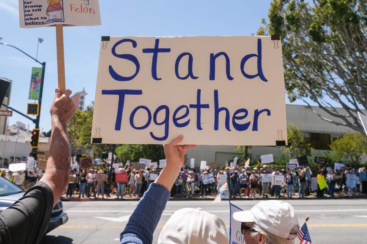 Around 5,000 people surrounded the San Luis Obispo Superior Court during the “Hands Off!” rally on April 5, 2025, to protest President Donald Trump’s administration.