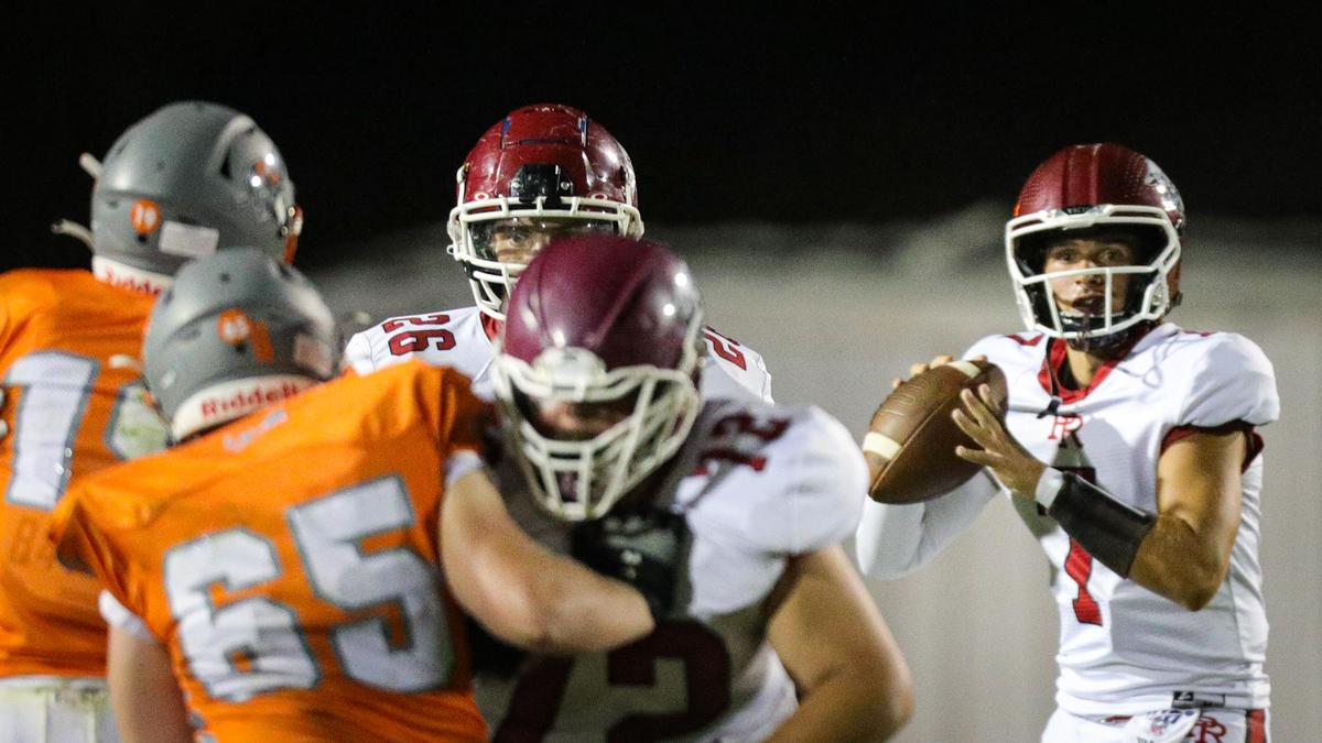 Tyler Luna drops back to pass for the Bearcats. In the annual rivalry game, Paso Robles beat Atascadero 35-21 on Sept. 2, 2022.