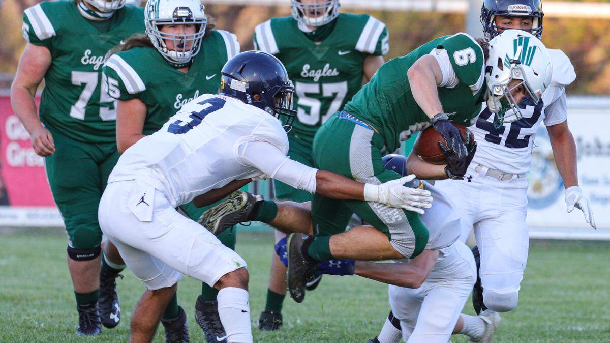 Joshua Berna jumps to avoid Arroyo Grande tackles in April 2021. Templeton High School hosted Arroyo Grande in a battle of the Eagles football teams. Berna will play in the FCA-All Star game on Saturday.