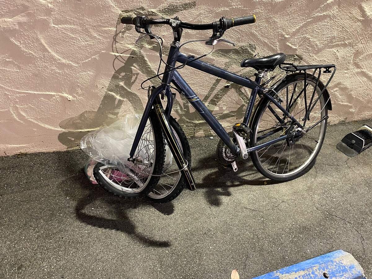 A San Luis Obispo cyclist was hit by a truck and dragged around 30 feet down Broad Street late Tuesday evening.