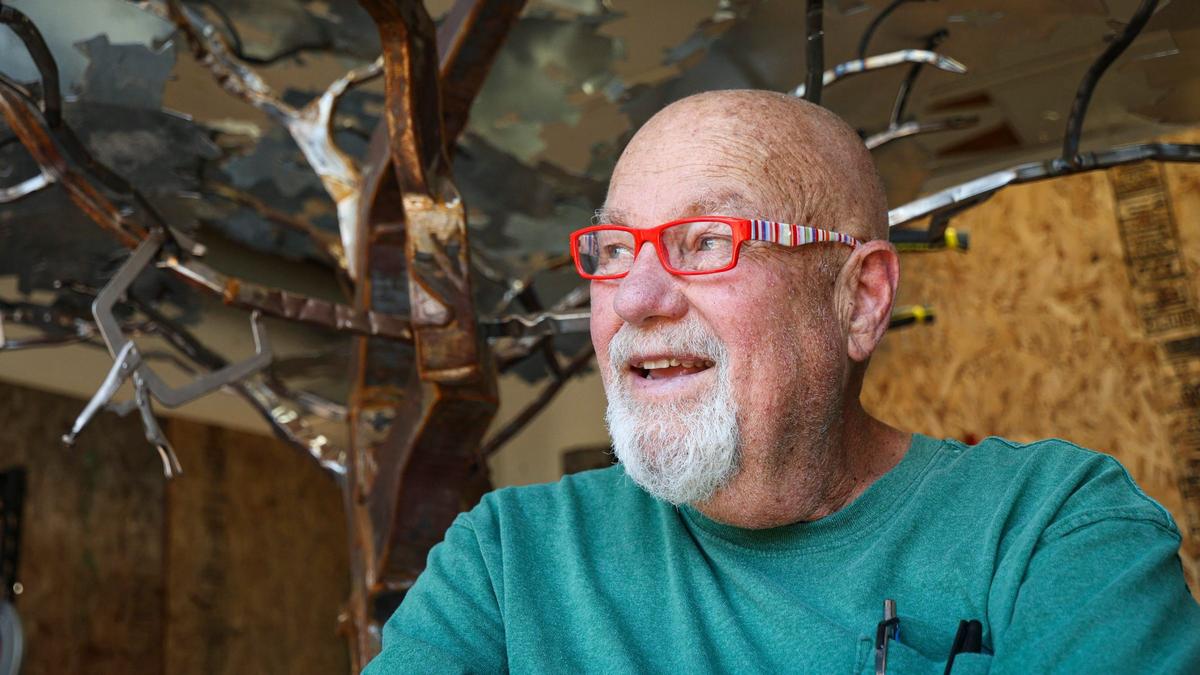 Allen Root, a metal artist seen here at his studio on July 10, 202, has been battling late-stage prostate cancer for nearly nine years while having difficulties finding specialists in San Luis Obispo County.
