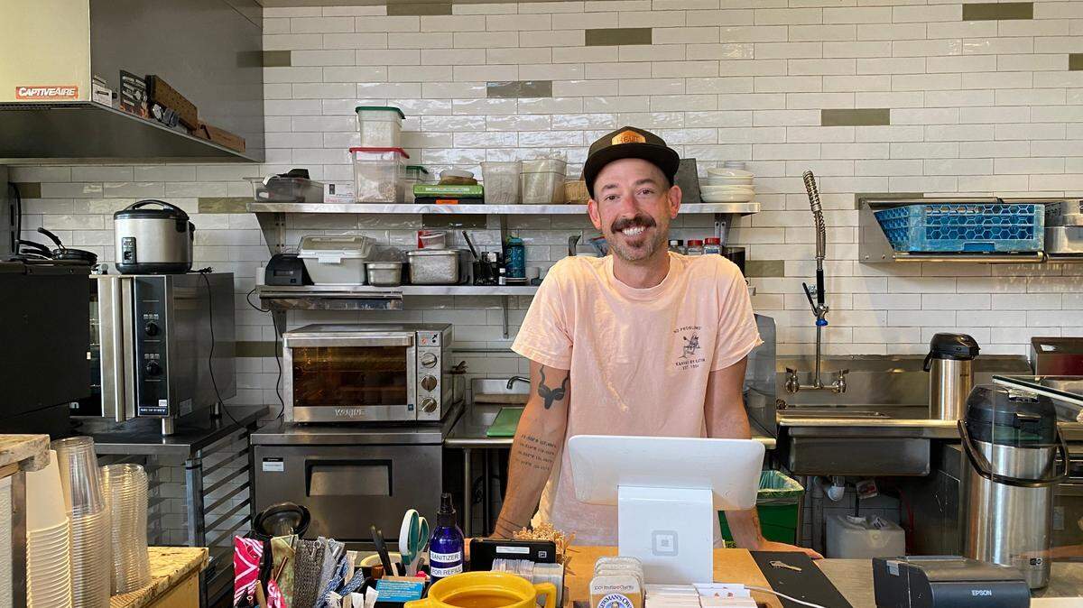 Mint + Craft general manager Joshua Ashby started with the cafe in June 2020. The cafe reduced its menu and expanded takeout services to adapt to the coronavirus pandemic, he said.