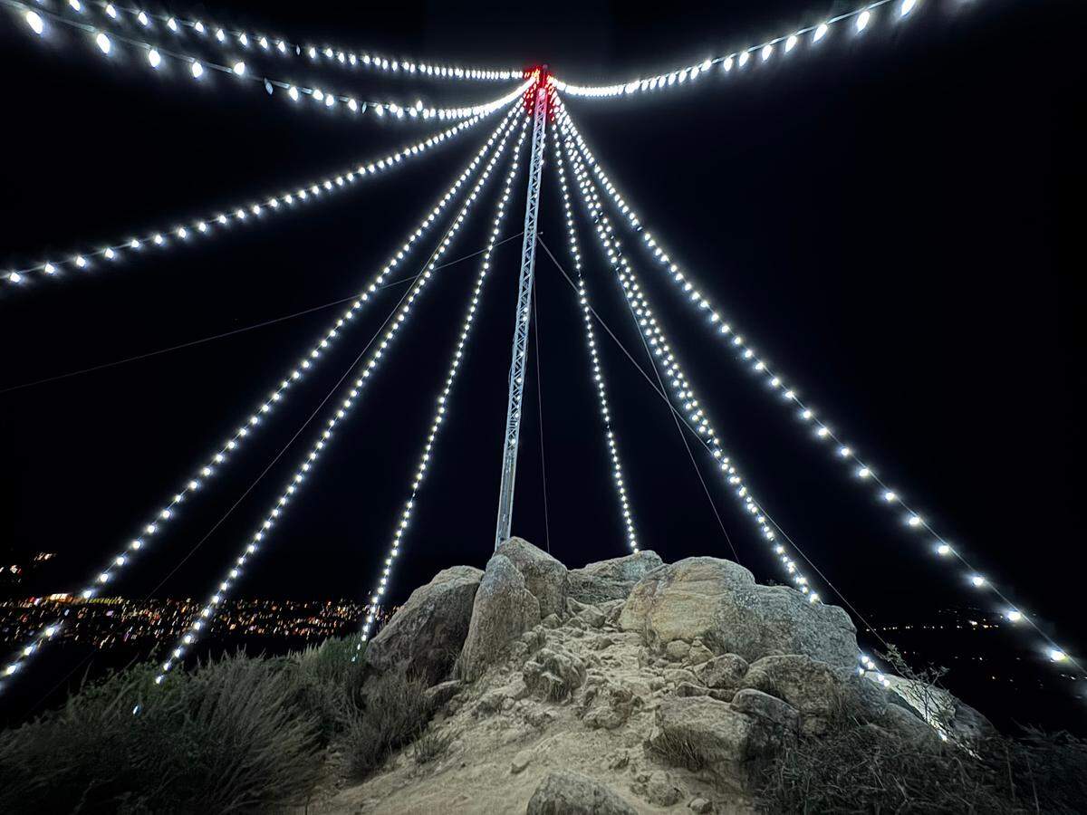 Twelve strands of lights make up the Christmas tree perched on top of Cerro San Luis on Dec. 9, 2024.