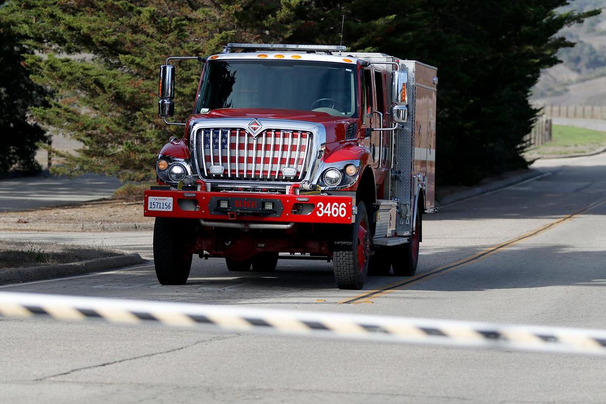 A fire engine responds to the Hearst Castle visitor center on Saturday, Oct. 22, 2022, after multiple people were burned when a radiator failure send hot fluid pouring through a tour bus.