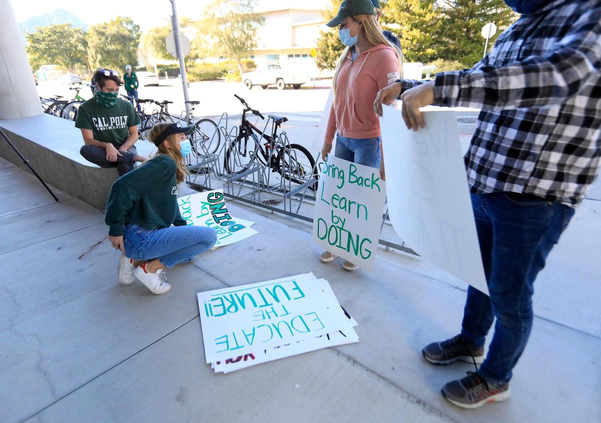 Cal Poly students gather Friday ahead of a march around campus demanding more in-person classes despite the ongoing coronavirus pandemic.