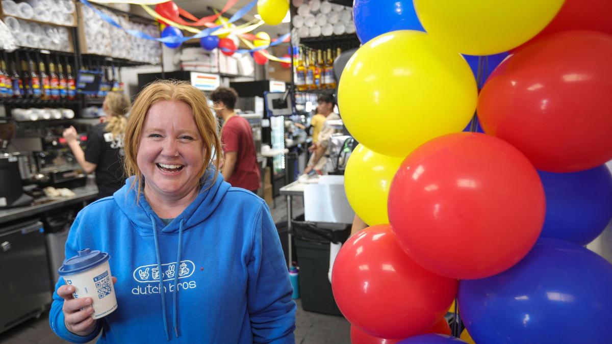 Molly Jeffers, regional operator for Dutch Bros Coffee celebrates with her crew the opening of a new location in Atascadero at the Food 4 Less shopping center on March 10, 2025.
