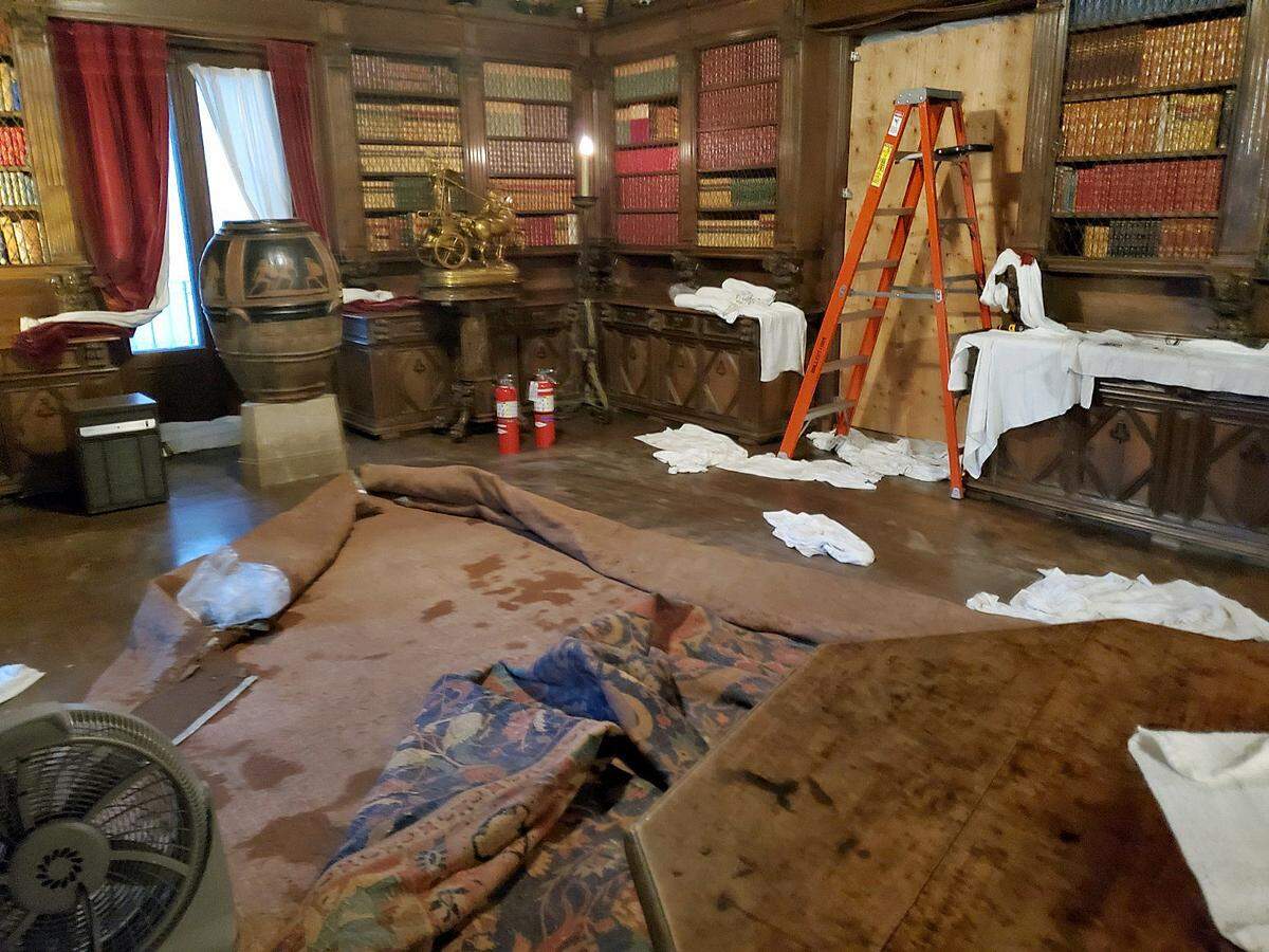 A glass and wood storm door at Hearst Castle failed Wednesday, sending waves of rainwater into the Main Library and down a two-story stairwell into a basement area where furnishing were stored. While various items got soaked, state parks Superintendent Dan Falat said all are being properly dried and it appears that no authentic items in the collection were damaged.