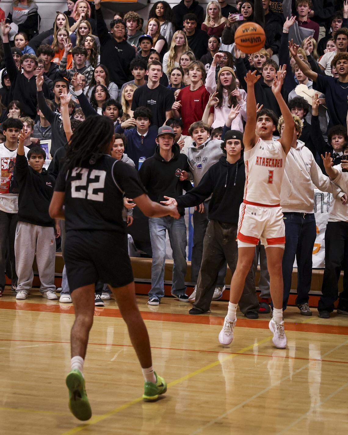 Isaiah Rodriguez shoots from behind the 3 point line. Atascadero beat Hoover 69-52 to advance to the final game in the Division II CIF Central Section Boys Basketball Championships. The Greyhounds lost Thursday 67-61 to Colony in the second round of state playoffs.