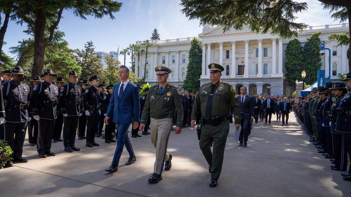 Gov. Gavin Newsom honors fallen California peace officers at memorial ceremony in May, 2024. The photo was shot by Charles Ommanney, a retired photojournalist who joined the governor’s staff in early 2024.