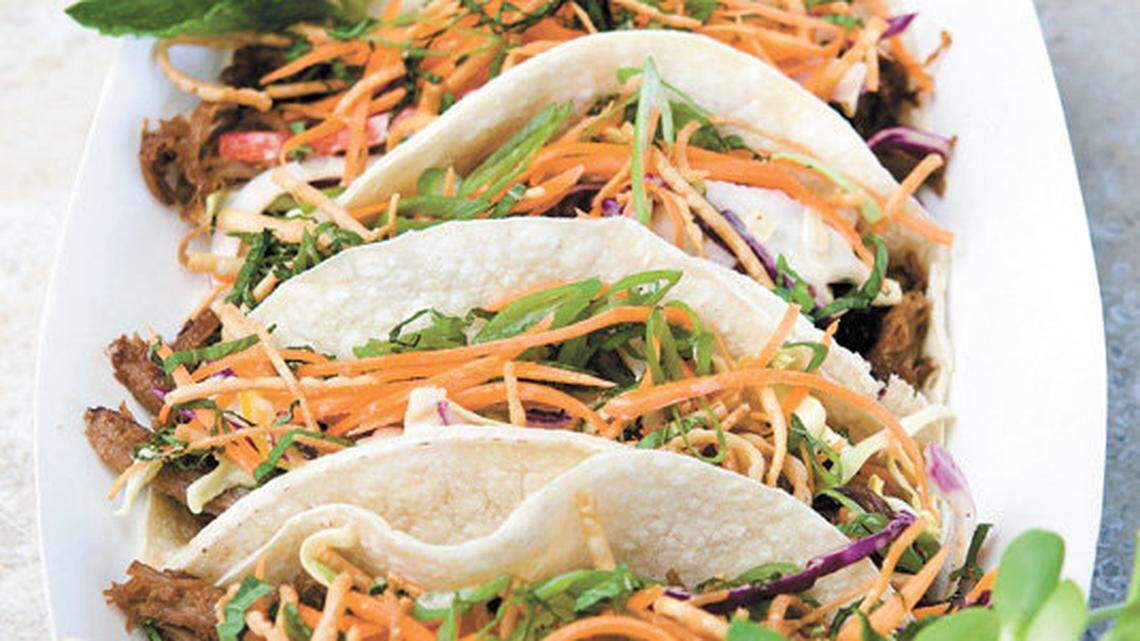 Porter's food truck's char siu pork tacos are served with a tangy hoisin sauce and coleslaw.
